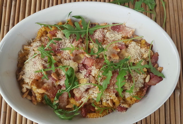 baked passatelli with pancetta and pine nuts 