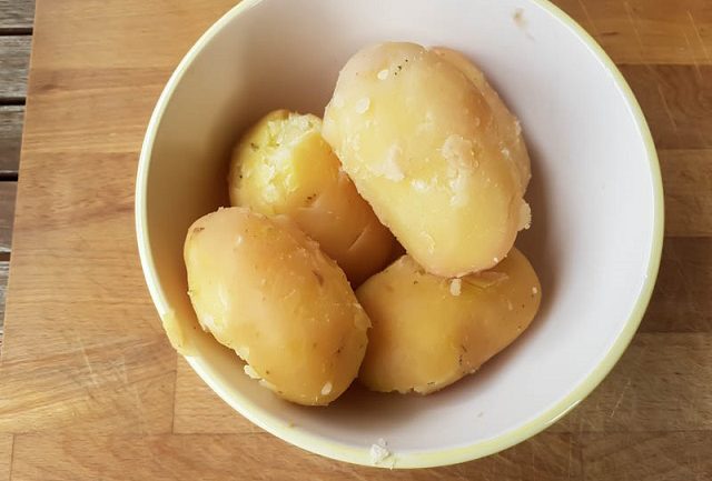 cooked and peeled potatoes