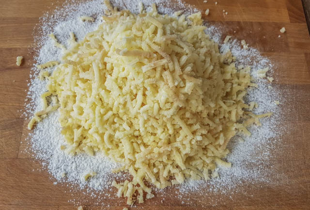 cooked potato after it has been passed through potato ricer