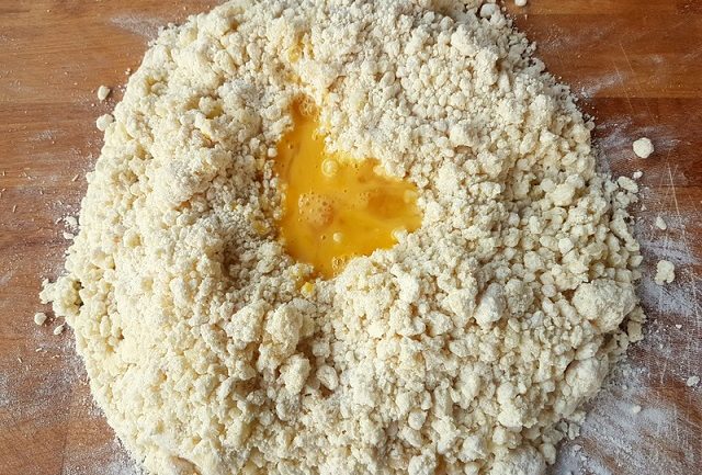 potato, flour and eggs on wooden board