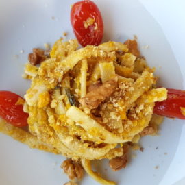 Scialatielli pasta with yellow peppers, tomatoes & walnuts