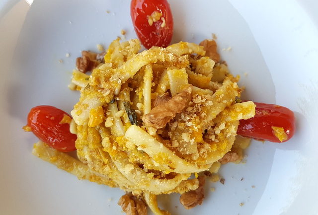 Scialatielli pasta with yellow peppers, tomatoes & walnuts 