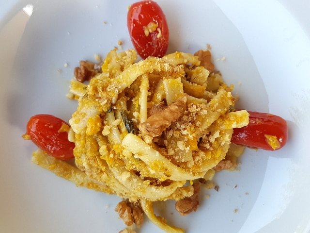 Scialatielli with yellow peppers, cherry tomatoes and walnuts.