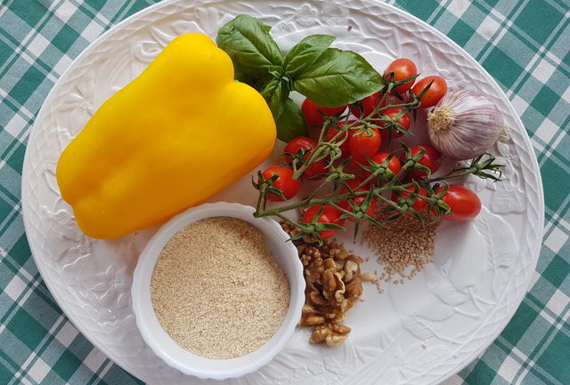 Scialatielli pasta with yellow peppers, tomatoes & walnuts