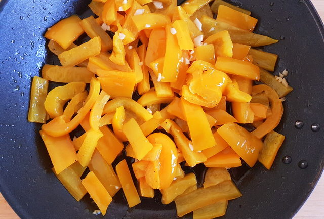 Scialatielli pasta with yellow peppers, tomatoes & walnuts