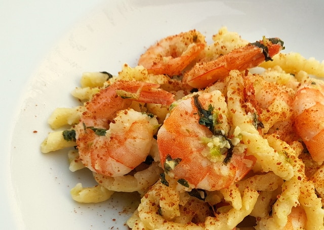 Busiate pasta with bottarga, almonds and prawns