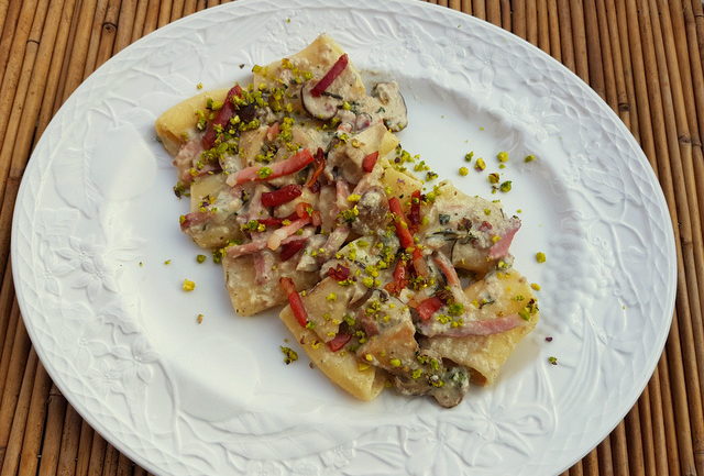 Paccheri with porcini, speck and pistachio