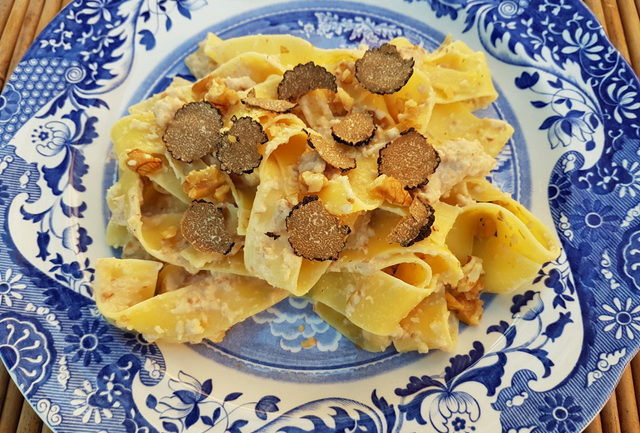 Pappardelle pasta with walnut sauce and black truffle