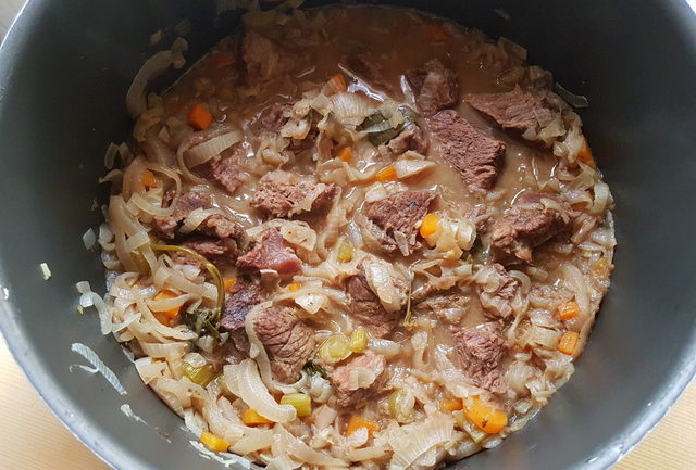 la Genovese ragu cooking in pot