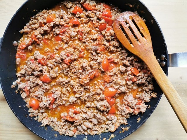 ragu for fregnacce Abruzzesi cooking in skillet