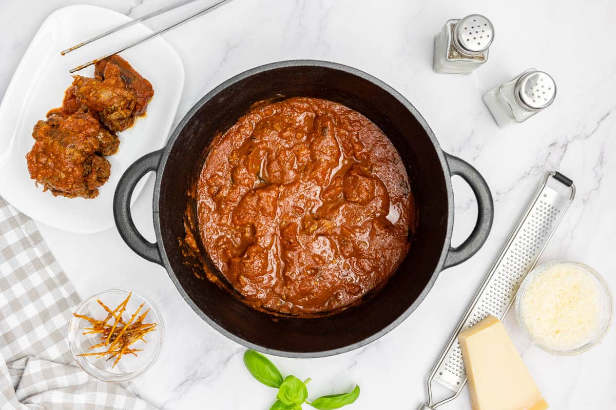 Braciole that has been simmered in a tomato sauce for 2 hours
