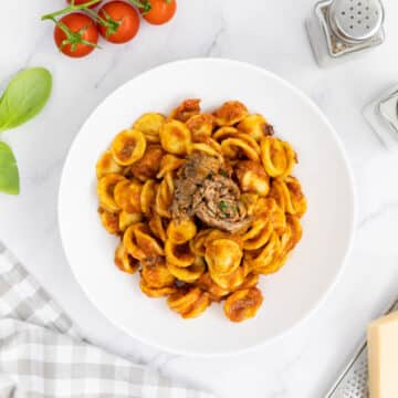 Italian braciole with orecchiette in a bowl