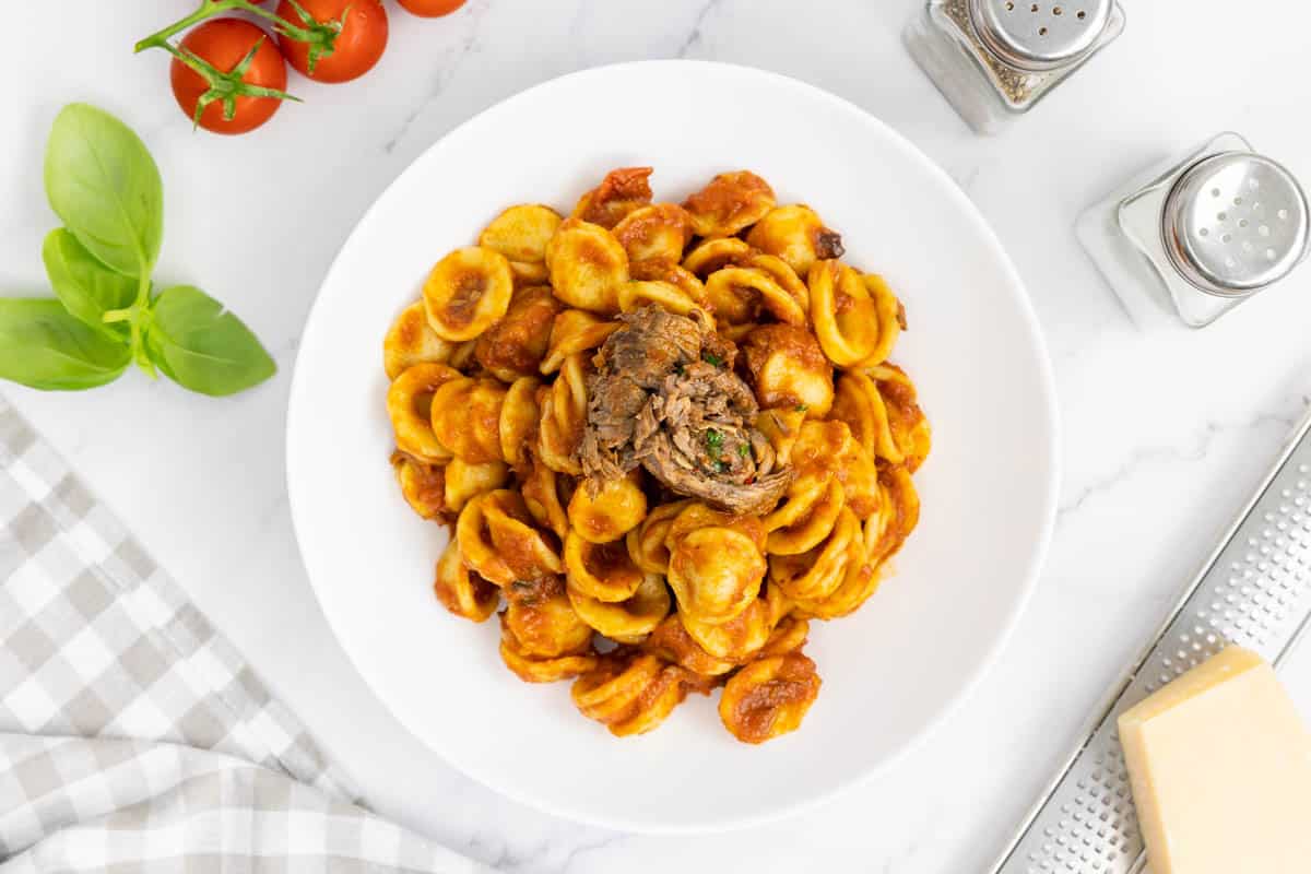 Italian braciole with orecchiette in a bowl