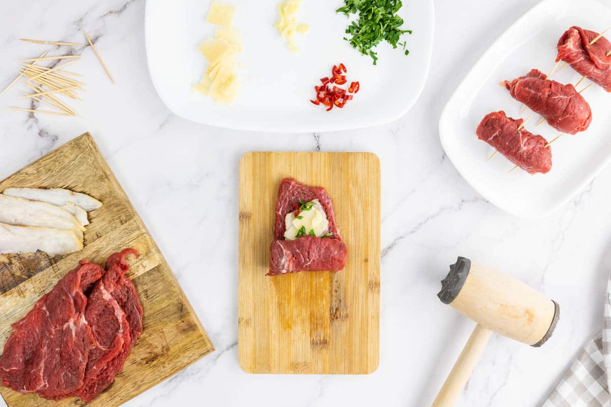 Rolling the Braciole on a wooden board