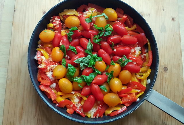 ingredients for bucatini with red and yellow cherry tomatoes and peppers recipe in frying pan