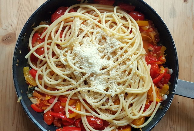 bucatini with red and yellow cherry tomatoes and peppers 