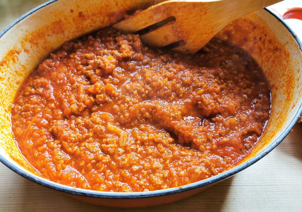 ready cooked ragu in Dutch oven