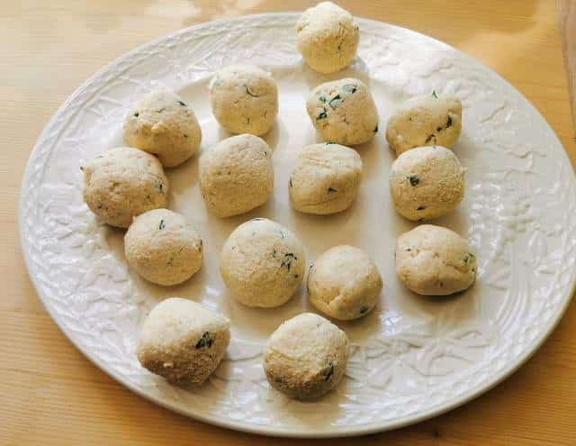 prepared ricotta balls on white plate