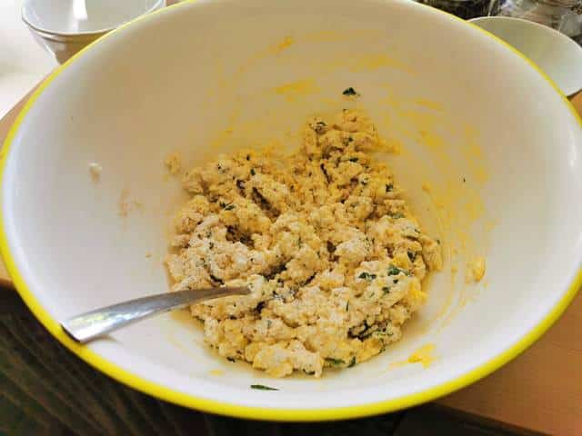 ricotta, breadcrumbs, eggs, parsley, garlic mixed in large bowl