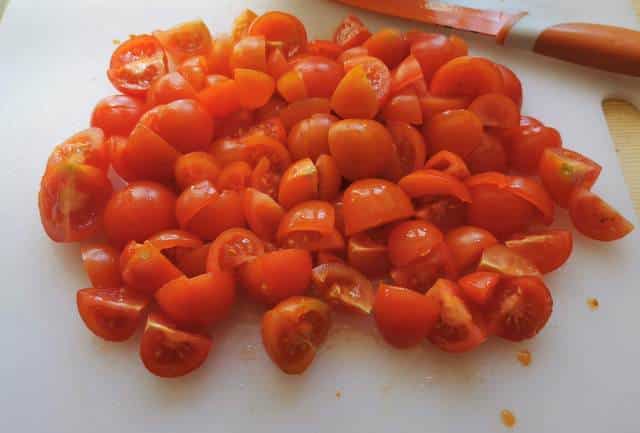 cherry tomatoes cut into halves and quarters