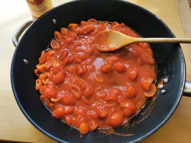 tomato sauce made with cherry tomatoes and passata in skillet