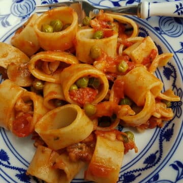 Calamarata pasta with stewed cuttlefish and peas