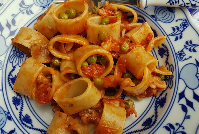 Calamarata pasta with stewed cuttlefish and peas