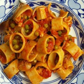 Calamarata pasta with stewed cuttlefish and peas