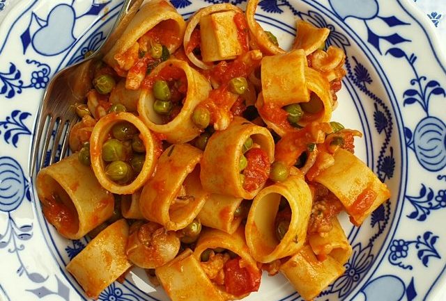 Calamarata pasta with stewed cuttlefish and peas