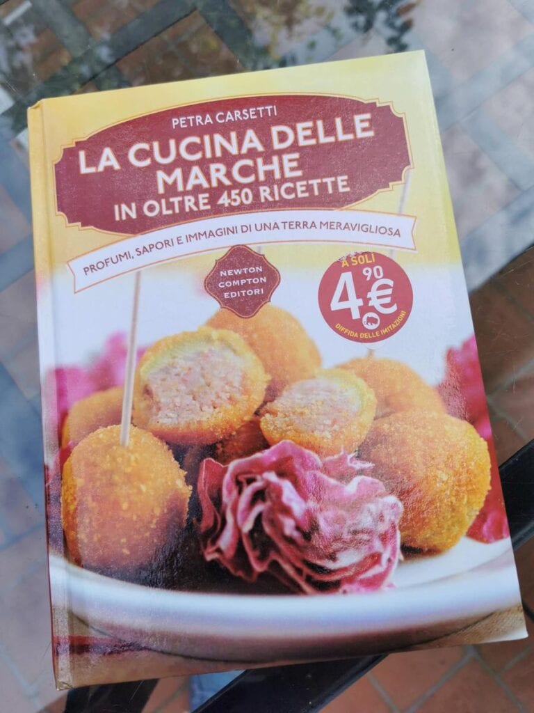 Cover of Italian cookbook with recipes from Marche