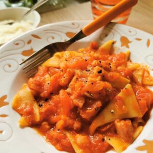 Corn and wheat flour pasta triangles with pancetta.