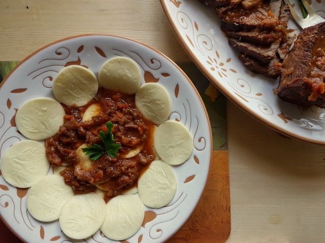 Corzetti with Genovese meat sauce