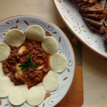 Corzetti pasta with Genovese meat sauce