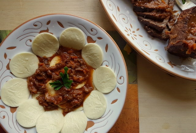 Corzetti pasta with Genovese meat sauce