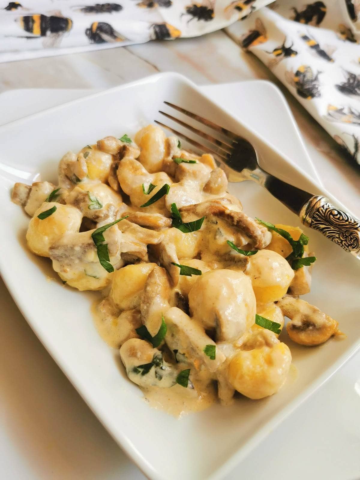 Creamy mushroom gnocchi with stracchino crescenza.