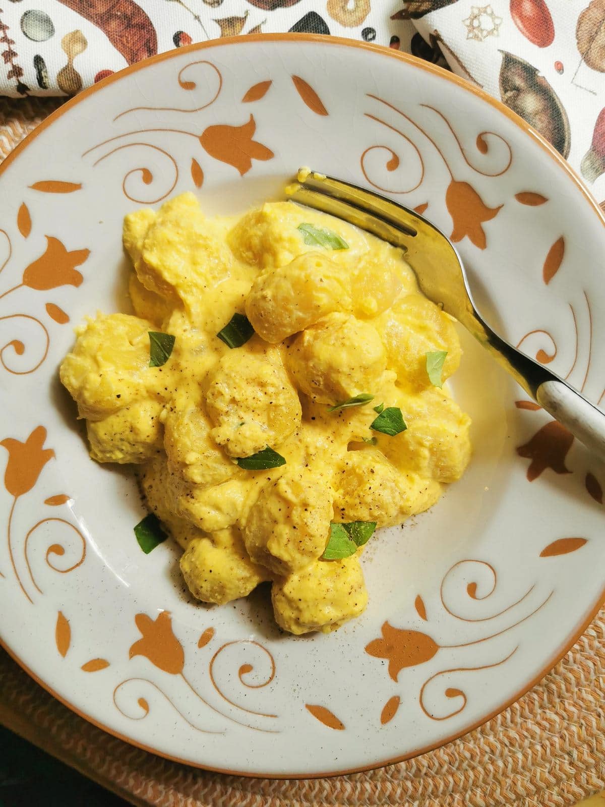 Potato gnocchi with creamy saffron sauce.