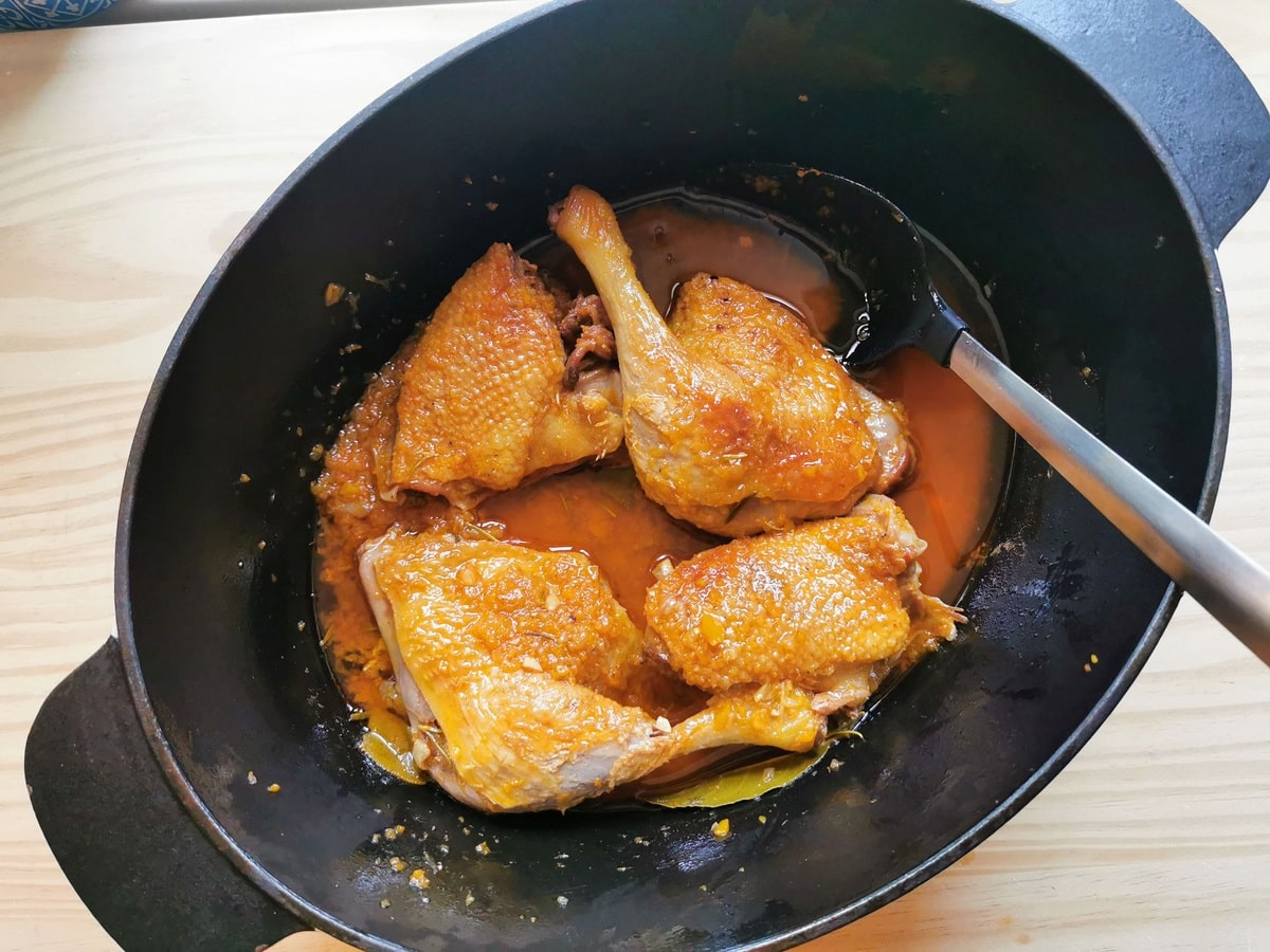 Slow cooked duck ragu in a pot.