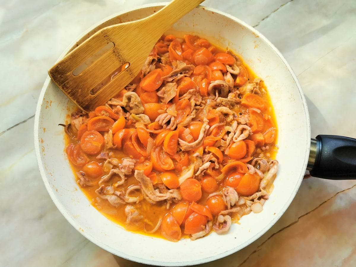 squid pasta sauce cooking in frying pan