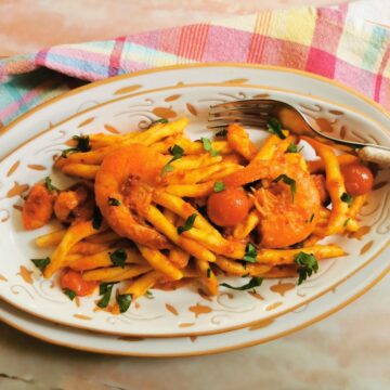 Spicy pasta with nduja sauce and shrimp.