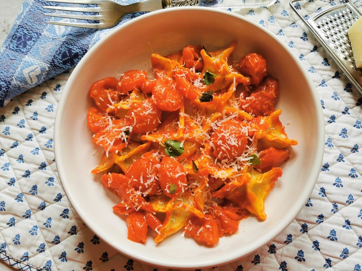 Fagottini pasta in a cherry tomato sauce with grated parmigiano reggiano.