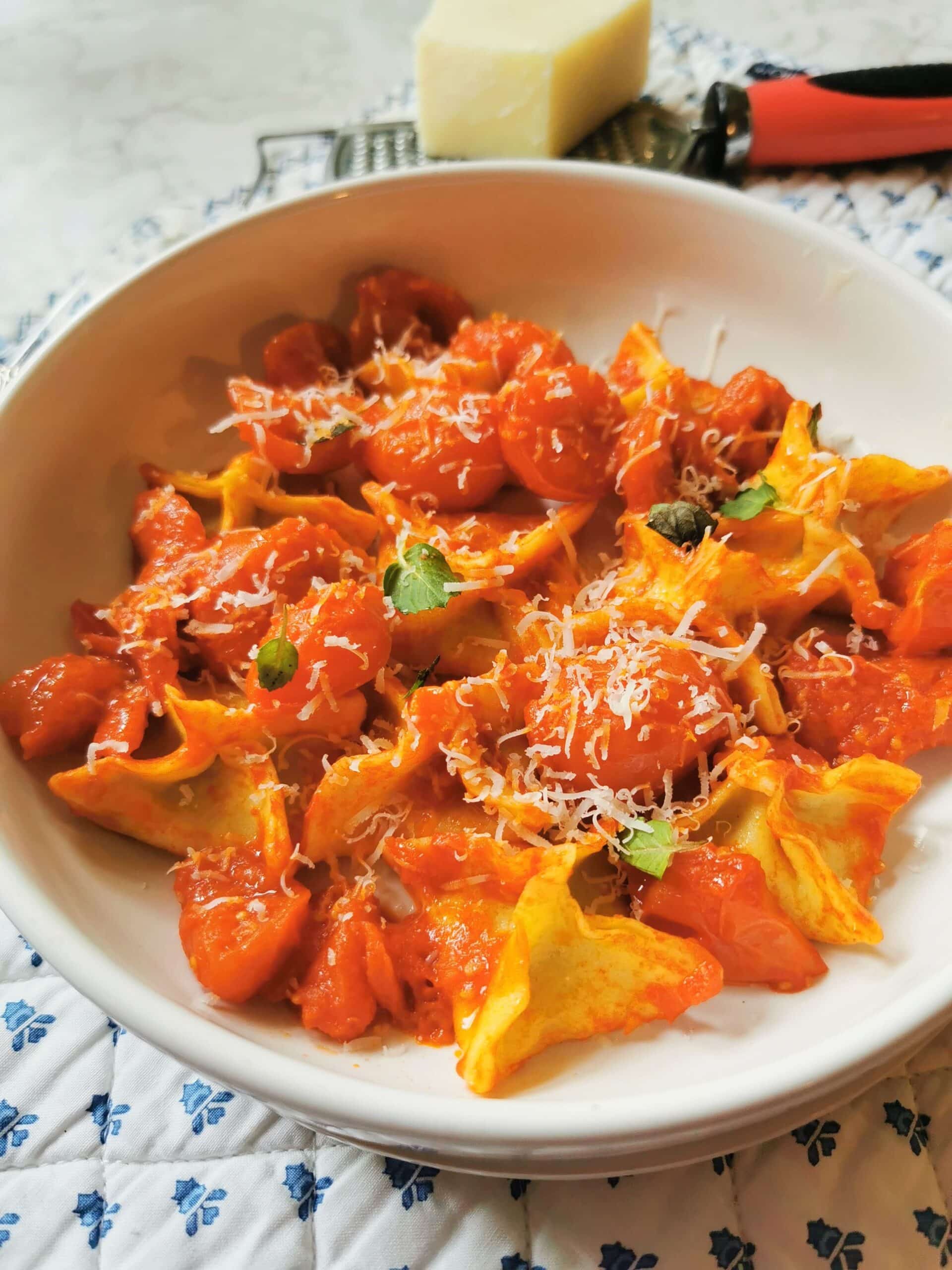 Fagottini pasta garnished with fresh mint leaves.