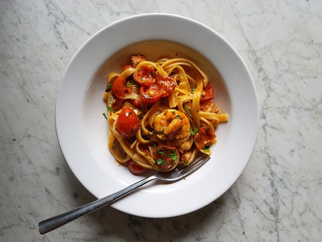 Fettuccine with giant prawns and cherry tomatoes