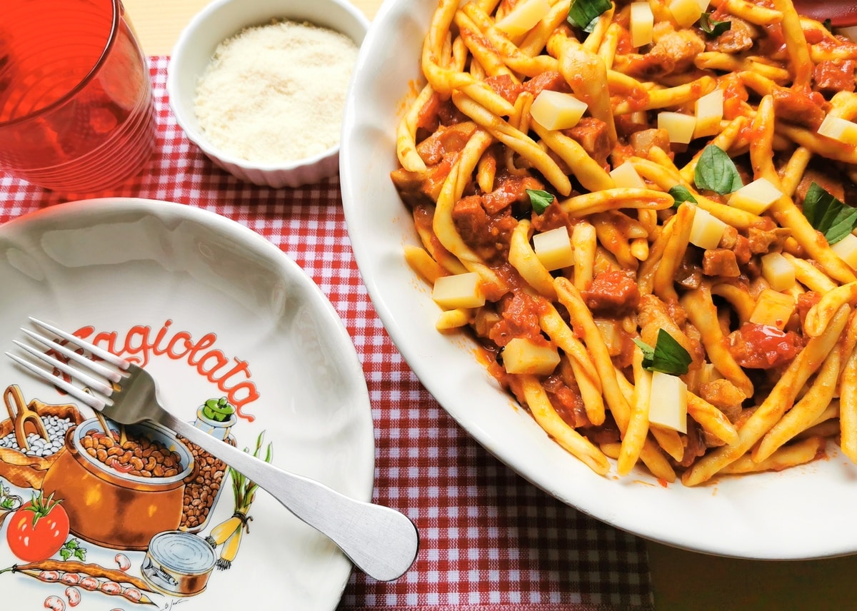 Cooked Calabrian fileja pasta alla Silana in a large white bowl.