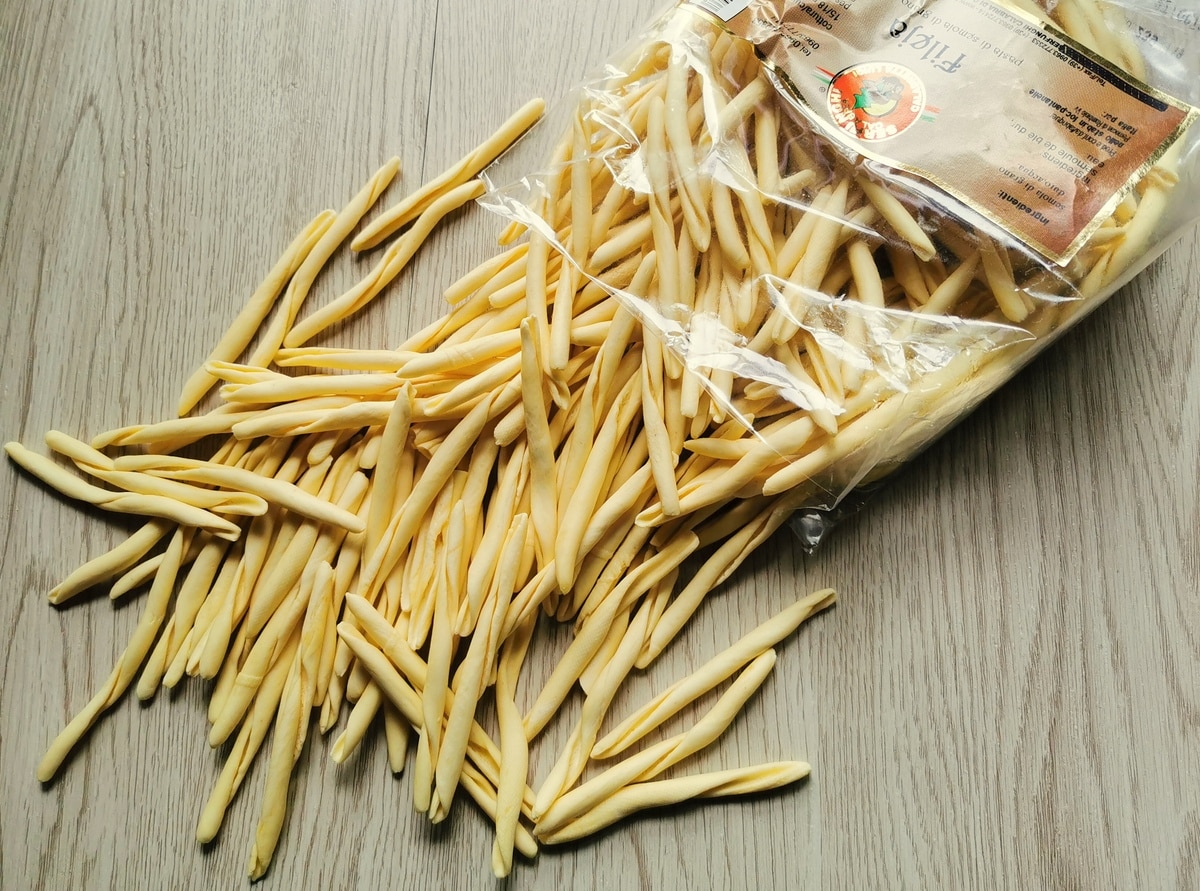 Handmade fusilli on a kitchen counter.