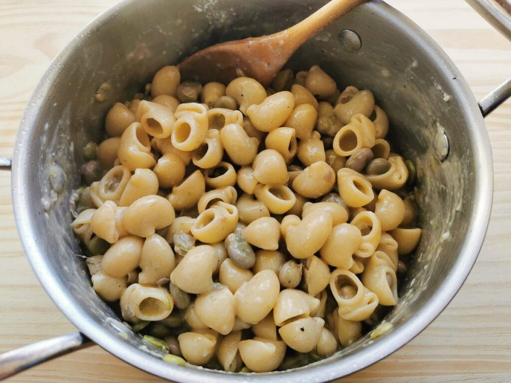 fresh fava beans with pasta in pot