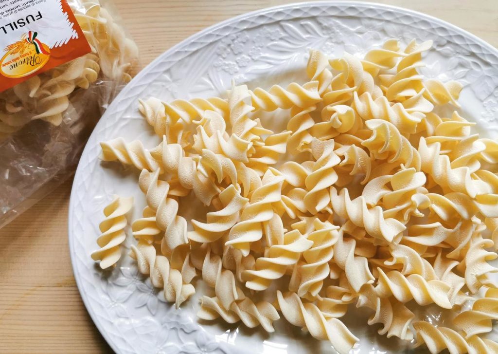 giant fusilli (fusilloni) on white plate