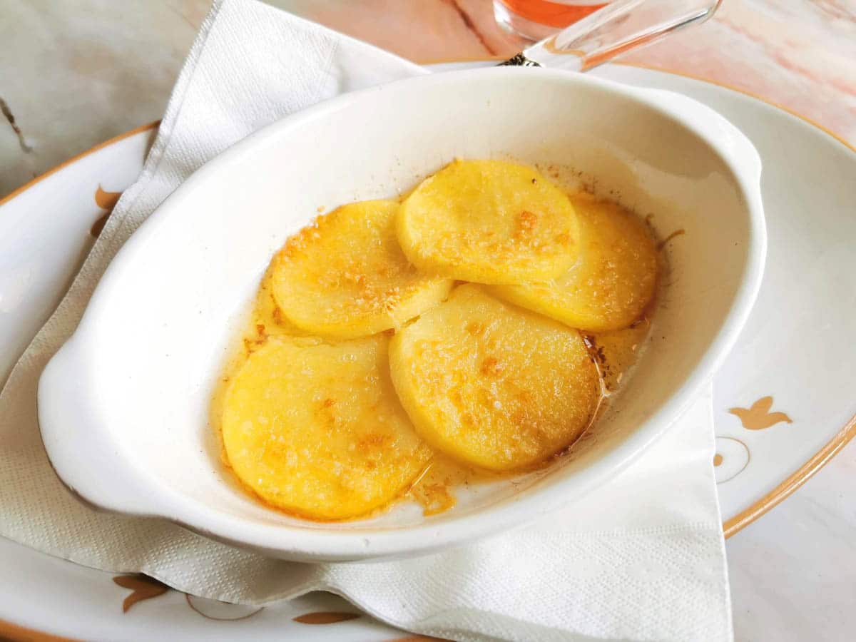 Gnocchi alla Romana in a baking dish.