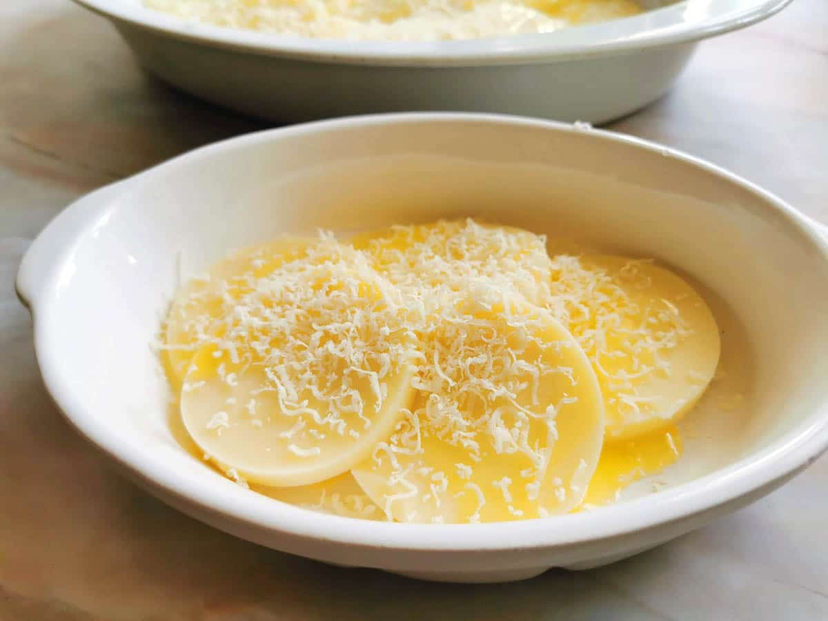 Gnocchi cut into circles and arranged in a baking dish