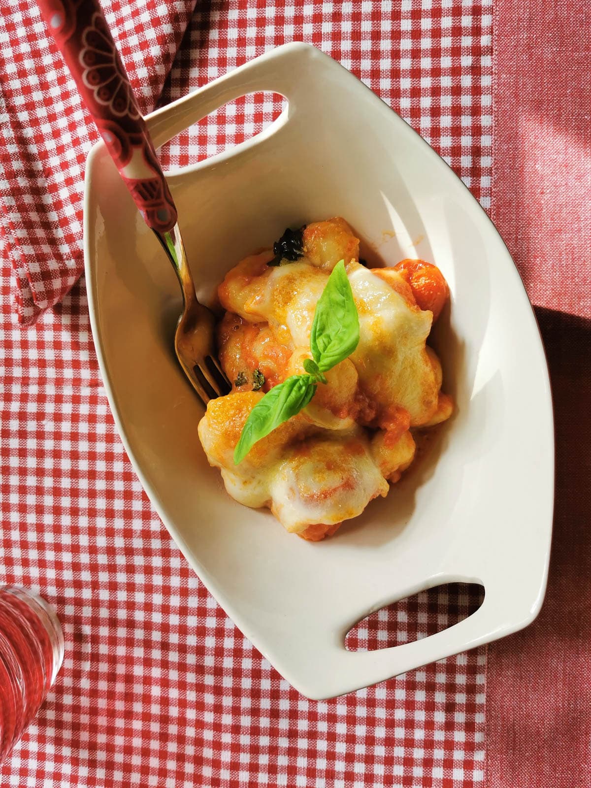 Gnocchi alla Sorrentina with basil.