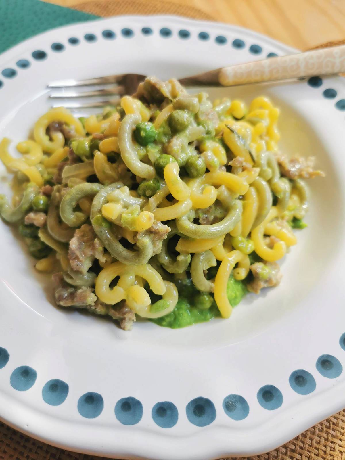 Gramigna pasta with Italian sausage, cream and peas.